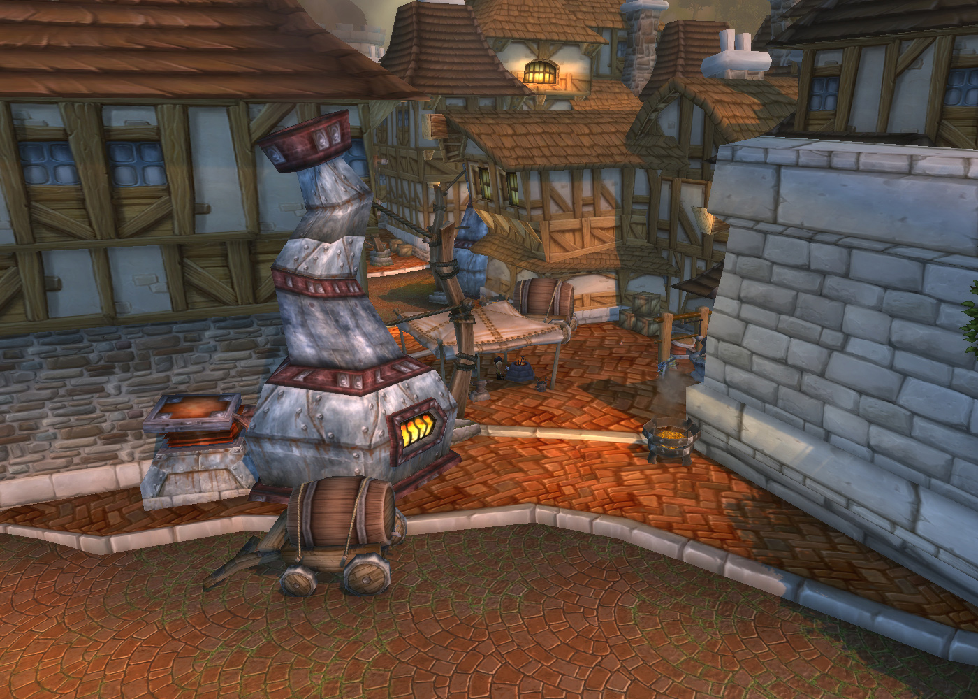 Stormwind'de bir sokakta demirci ocağı, örs ve bir fıçı arabası